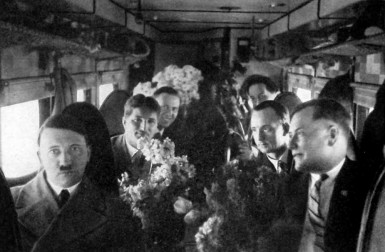 Berchtold sitting behind Hitler during an election campaign flight (on Hitler's birthday, April 20, 1932)