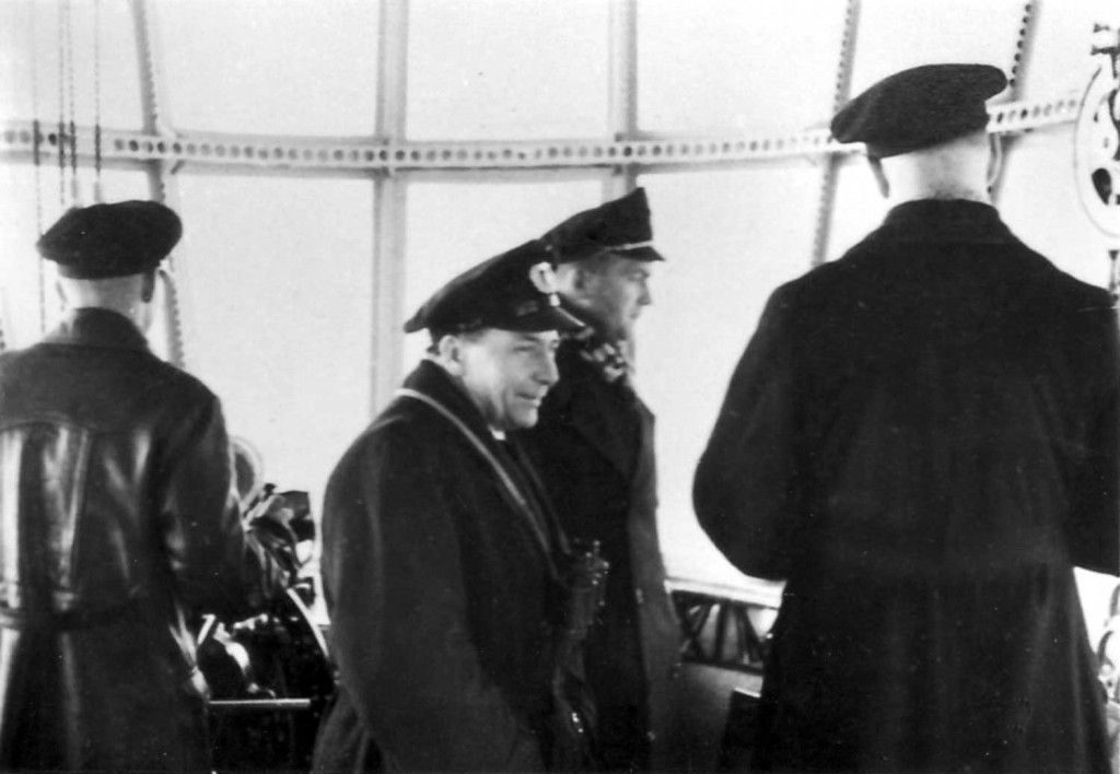 Captain Ernst Lehmann (center), Captain Heinrich Bauer (right), and Watch Officer Knut Eckener (far right) in Hindenburg's Control Room